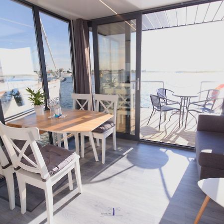 Hausboot Fjord Lacerta Mit Dachterrasse In Wendtorf Esterno foto