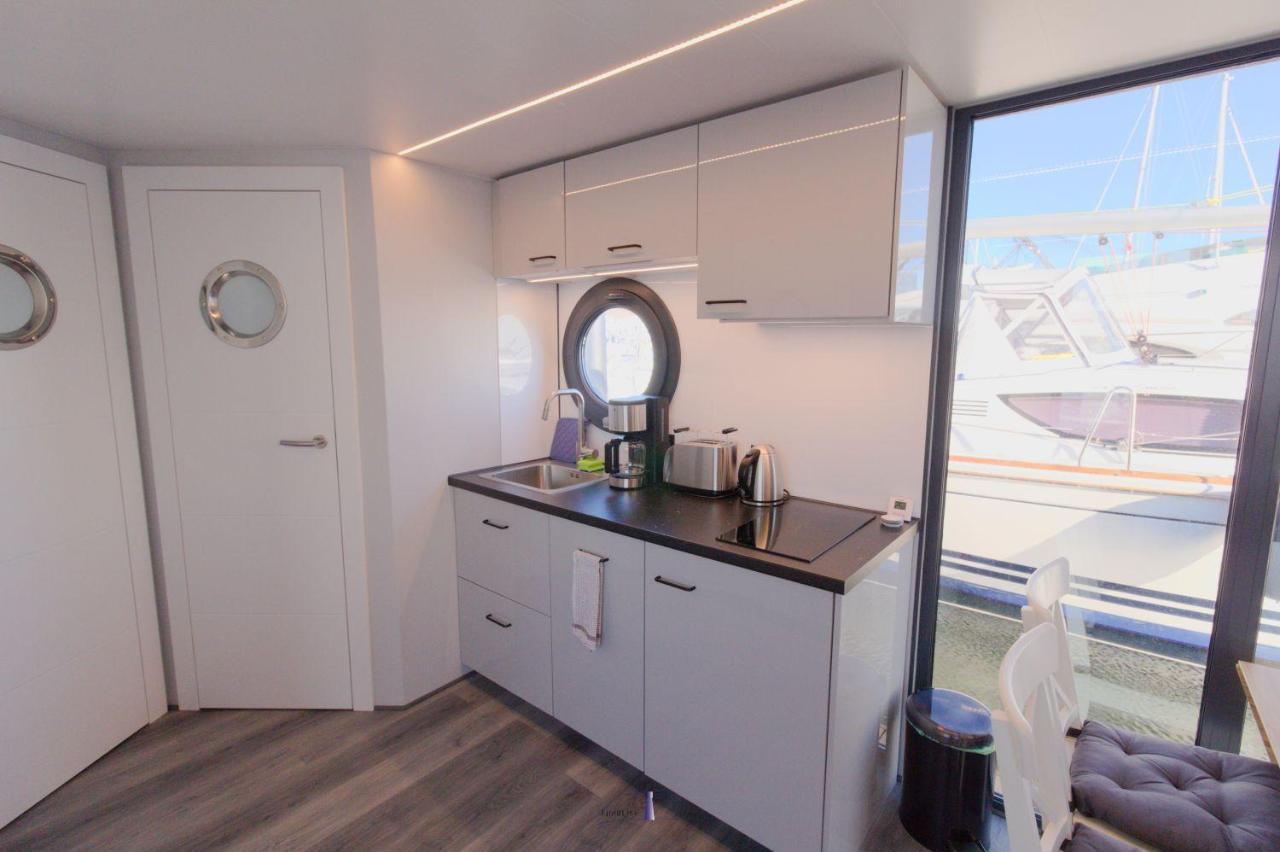 Hausboot Fjord Lacerta Mit Dachterrasse In Wendtorf Esterno foto